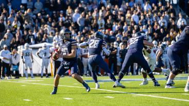 Mines QB John Matocha drops back for pass