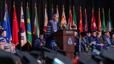 President Johnson speaks during Midyear commencement