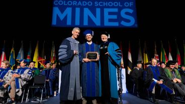 Will Daniels wins Rath Award at Fall 2024 Graduate Commencement