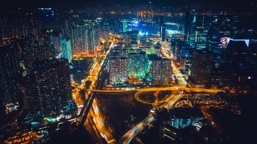Illustration of city illuminated at night