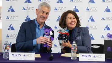 Mines President swaps mascot plushies with ACC president