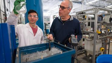 Louis Miyasaki and Professor Tzahi Cath work with the electrocoagulation pilot system in the Center for a Sustainable WE2ST at Mines. 