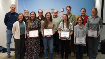 group shot of faculty award winners with Provost Tompkins and President Johnson
