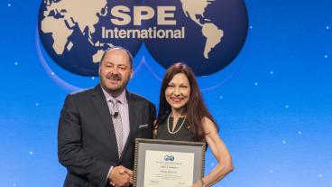 Mines Professor Linda Battalora accepting her SPE Distinguished Membership