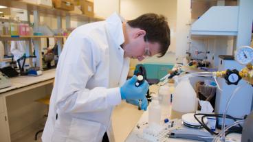 Mines student works on a  project in the radiochemistry lab