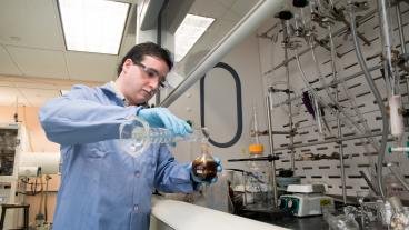 Assistant chemistry professor Shubham Vyas works in his lab at Colorado School of Mines.