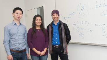 Physics professors Zhexuan Gong, Meenakshi Singh and Lincoln Carr