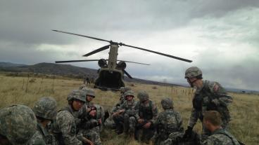 Buffalo Battalion cadets wait to board a Chinook Helicopter at the top of South Table Mountain