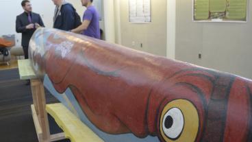 The canoe on display in the Brown Atrium.