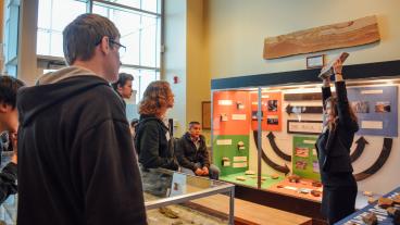  In one of the museum rotations geology graduate student Mandi Hutchinson guided students through a new Critical Materials Exhibit in the Mines Geology Museum as she led them through other parts of the museum.