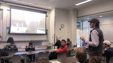 A student asks Lerner a question during the videoconference.