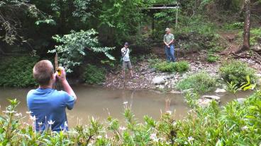 Mines students assess a potential bridge location in Nicaragua.