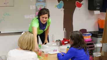 Liz Bell from WE2ST using gummie bears to demonstrate osmosis