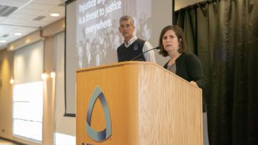 Andrea Salazar Morgan and President Paul C. Johnson announce the MLK Jr. Recognition Awards