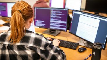 A Mines student works in a computer lab