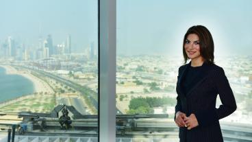 Shayma Amin poses in front of a window