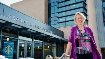Computer Science professor Tracy Camp outside George R. Brown Hall where she currently teaches Programming Concepts in C++.