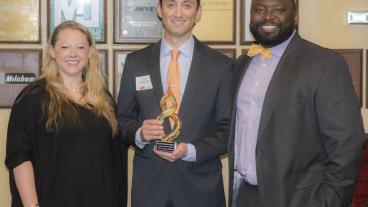 Mines graduate student Christopher Ruybal, center, at the 2017 Champions of Energy reception