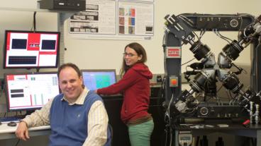 Mines Associate Professor Aaron Stebner works with Bucsek in his lab on the Mines campus.