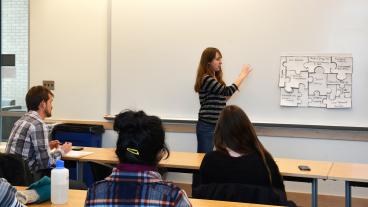 Environmental Engineering student Emily Arato presents during the first phase gate review.