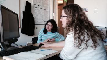 Junior chemical and biochemical engineering student Rima Baliga observes rotationplasty models on the screen at a meeting with mechanical engineering professor Dr. Anne Silverman.