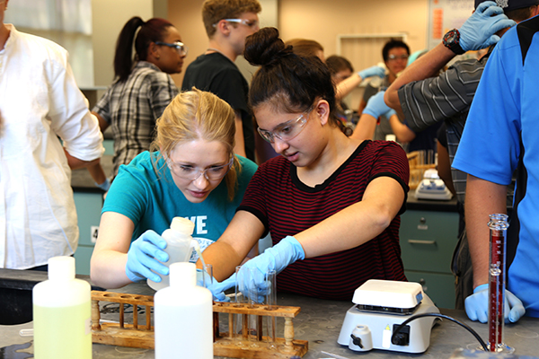 High school students in chemistry lab