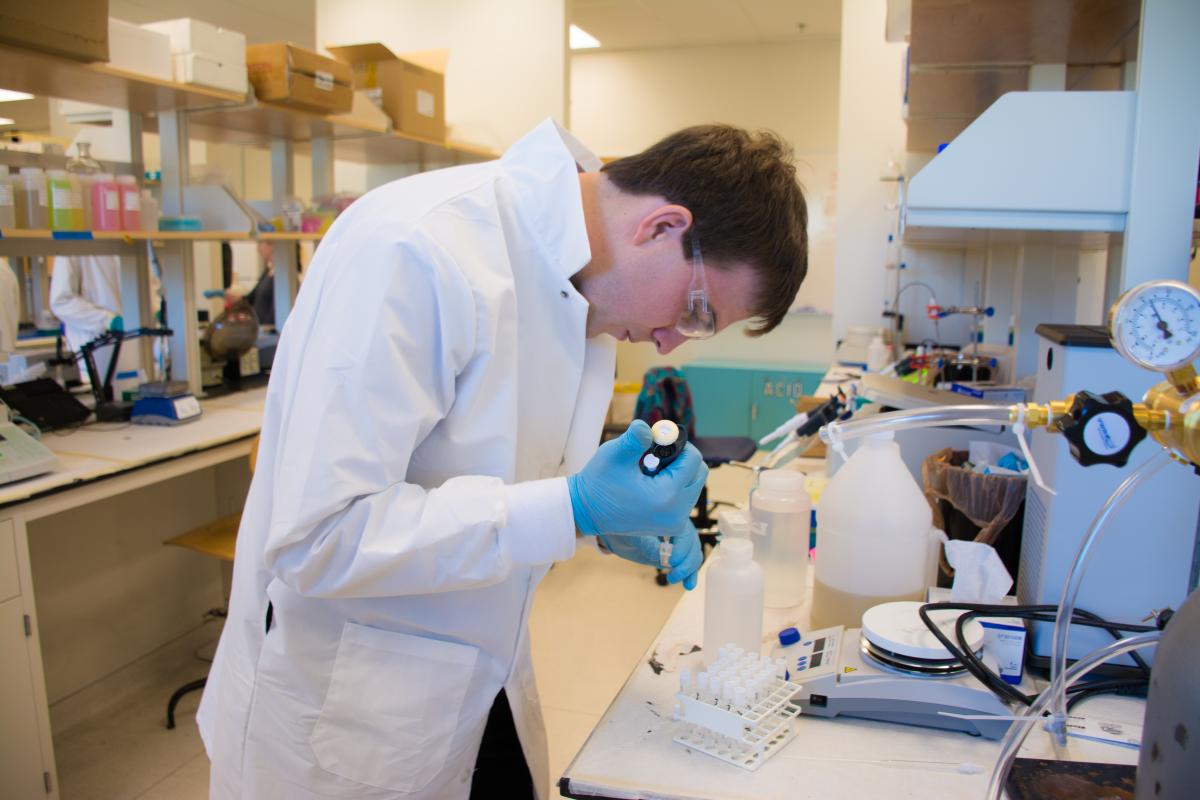 Mines student works on a project in the radiochemistry lab