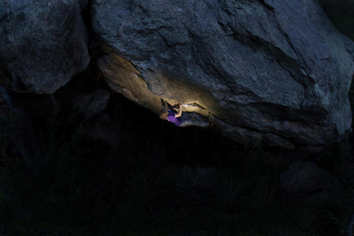 Physics student Martin Kuhnel rock climbing outdoors