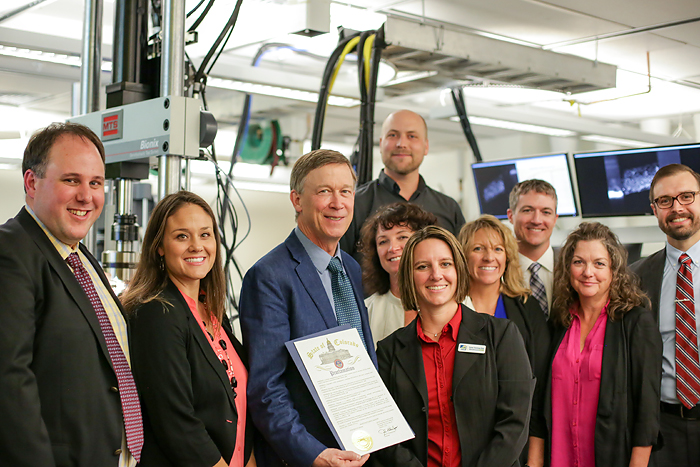 ADAPT team members and the governor celebrate the new proclamation.