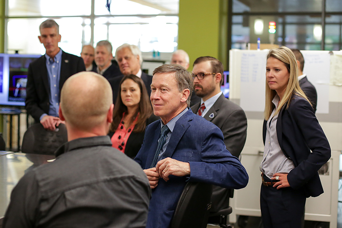 Gov. Hickenlooper listens as Research Associate Professor Branden Kappes describes the work of ADAPT.